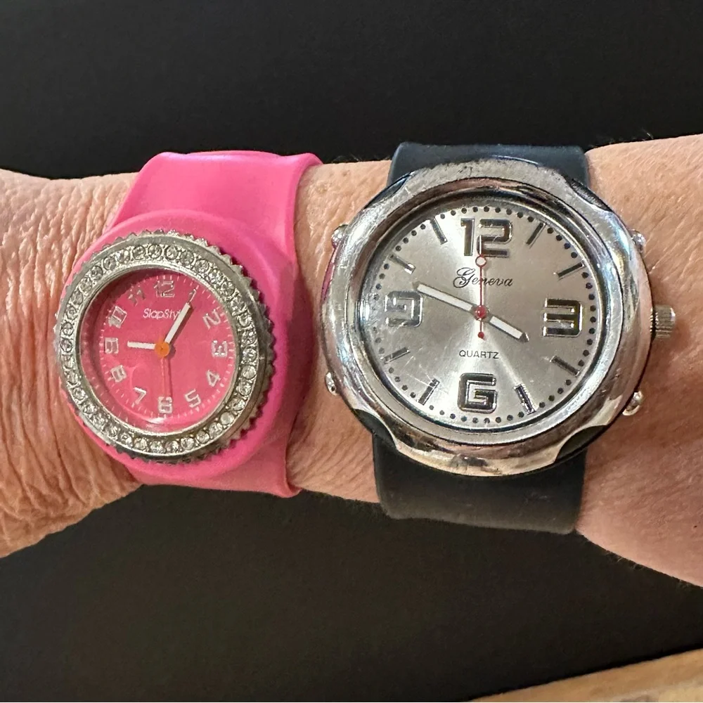 Pink and black snap wrist watches, set of two